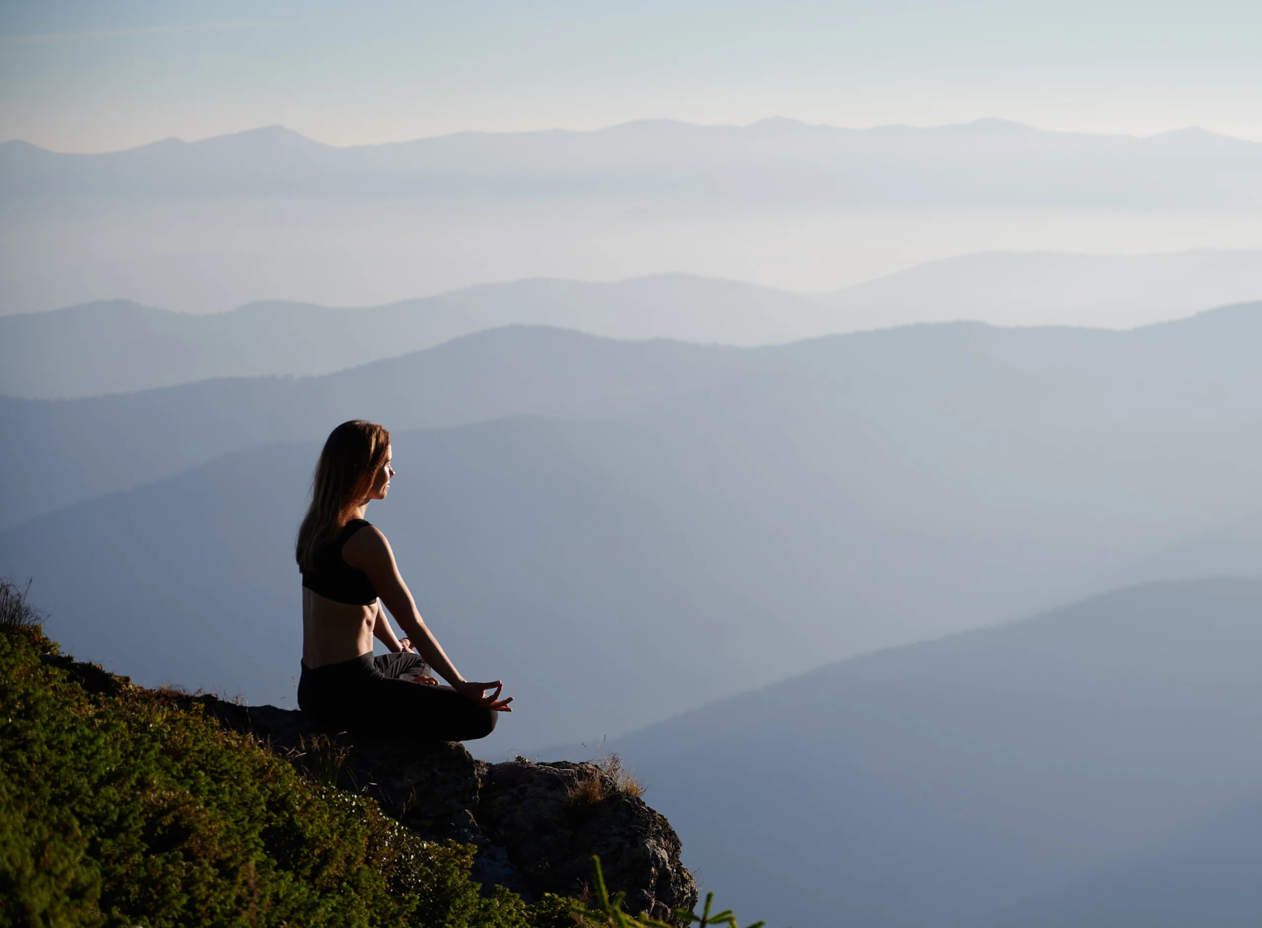 woman-relaxing-meditating-fresh-air